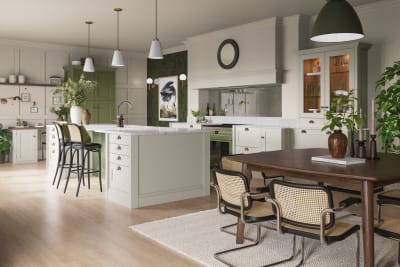Traditional Shaker-style kitchen range featuring panelled doors with visible woodgrain and beading detail