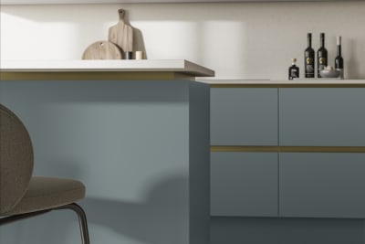 Modern and minimalist Integra Soho Duck Egg kitchen, a frameless slab door with integrated handles in a smooth paint finish.