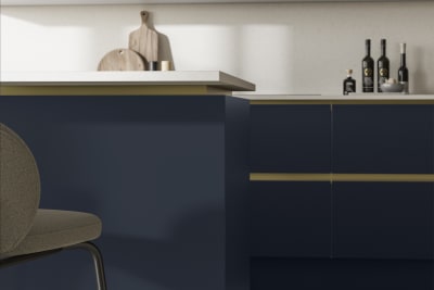 Modern and minimalist Integra Soho Midnight kitchen, a frameless slab door with integrated handles in a smooth paint finish.