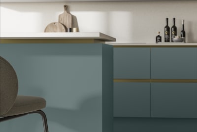 Modern and minimalist Integra Soho Morris Blue kitchen, a frameless slab door with integrated handles in a smooth paint finish.