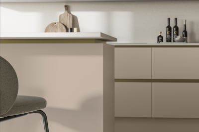 Modern and minimalist Integra Soho Shell kitchen, a frameless slab door with integrated handles in a smooth paint finish.