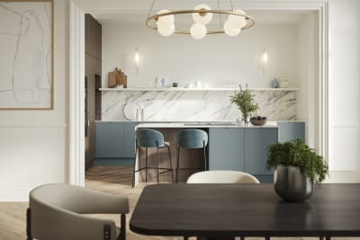 View of kitchen island in Soho Duck Blue kitchen from Magnet combined with Nordic Nature wood and paired beautifully with a marbled splashback.