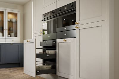 Contemporary Shaker kitchen Ambleside from Magnet in deep blue shade Lake, beige tall cabinets with ovens, brass knobs