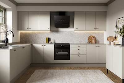 Modern slab kitchen Ascoli in neutral shade Limestone with brass knobs and black tap