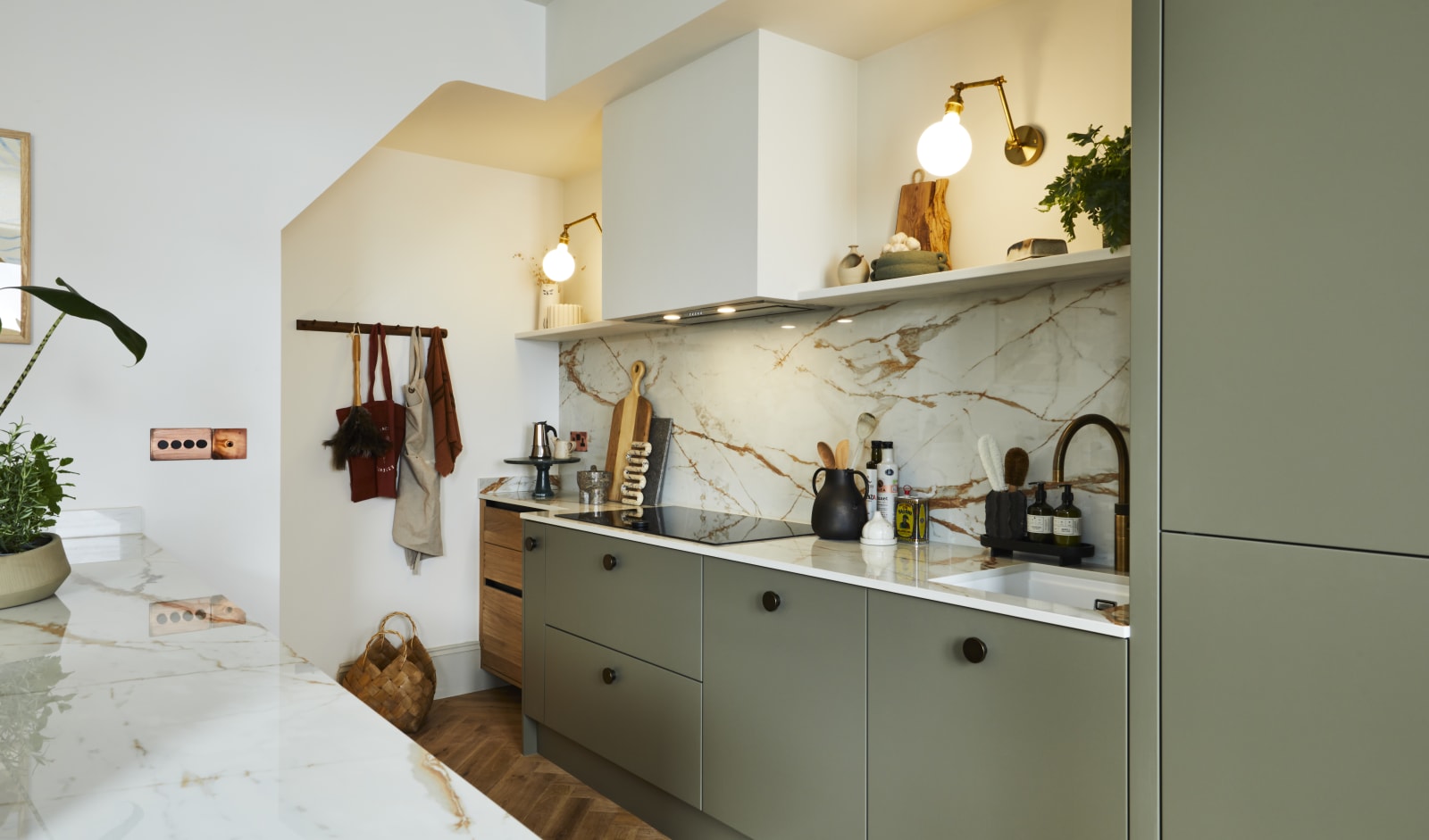 Modern slab Soho cabinets in the Balmoral colour, a soft beige green tone