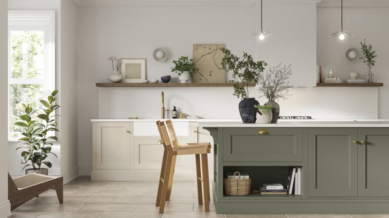Traditional Shaker-style kitchen range in light shade Pebble path with a green Misty Moors kitchen island.