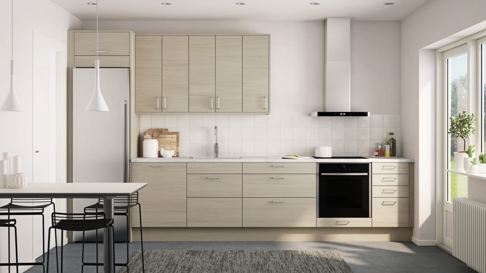 Elegant og moderne eikekjøkken. Slette fronter i eikefinér med integrert kantlist i eik som markerer kjøkkenets linjer og komposisjon.