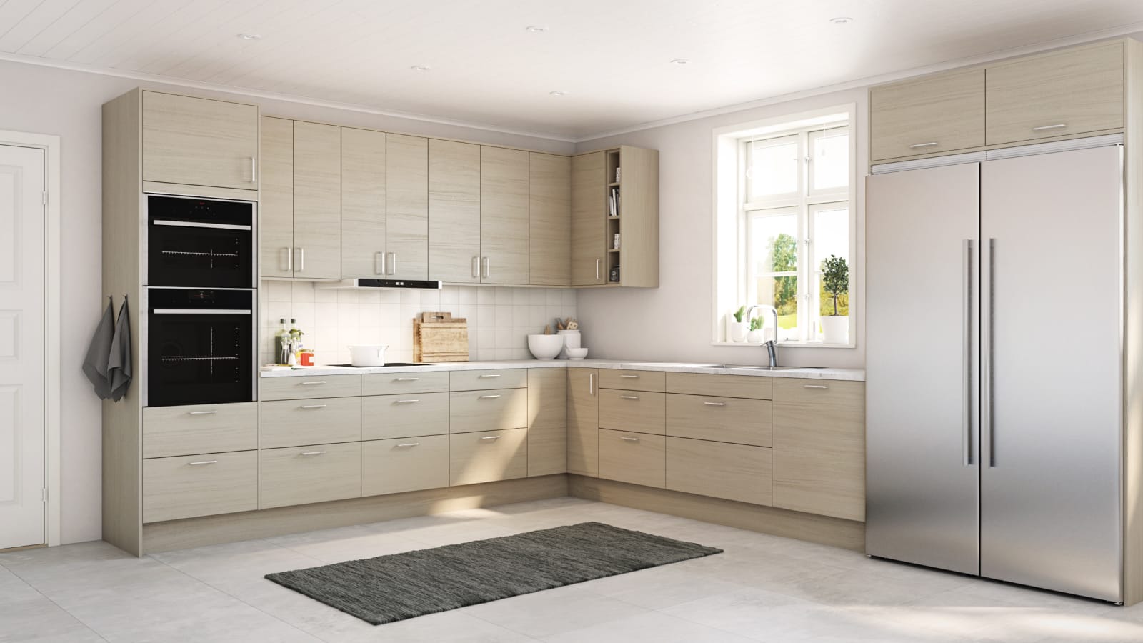 Elegant og moderne eikekjøkken. Slette fronter i eikefinér med integrert kantlist i eik som markerer kjøkkenets linjer og komposisjon.