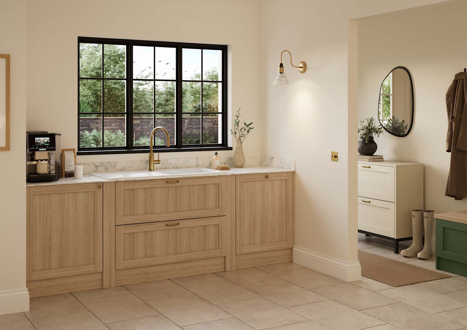 Traditional premium contemporary Shaker kitchen Ambleside in oak with brass knobs and handles, marbled worktop and upstand, brass tap and white ceramic sink.