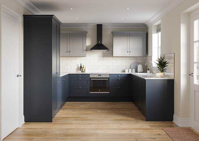 Tatton kitchen from Magnet, in U shape, with tall cabinets and matching kitchen counter cabinetry in dark blue shade Midnight paired with light grey wall cabinets over countertops, white worktop.