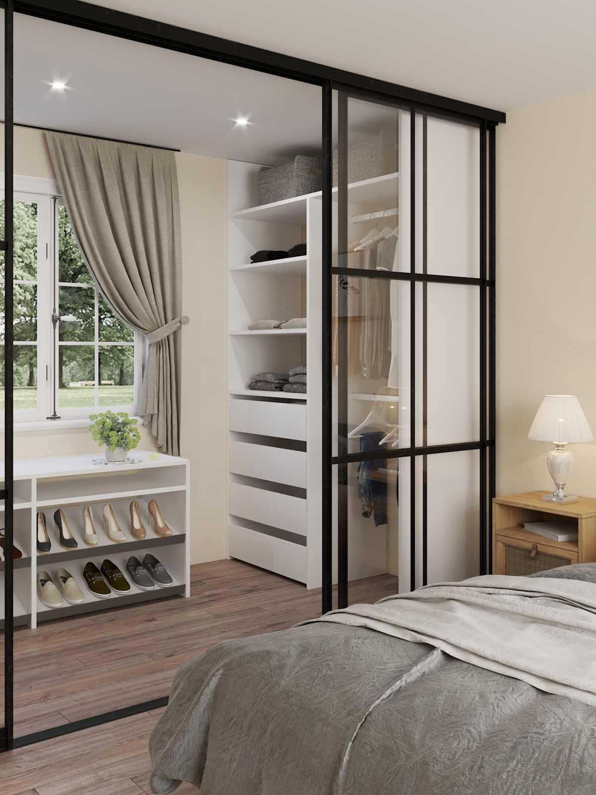 Walk-in garderobe i soveværelse med hvidt interiør og glasskydedøre med sort metalramme