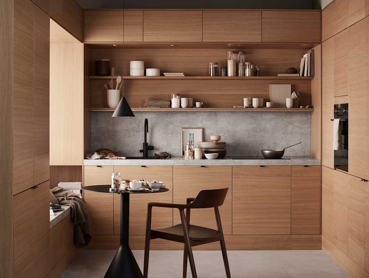 Elegant og moderne eikekjøkken. Slette fronter i eikefinér med integrert kantlist i eik som markerer kjøkkenets linjer og komposisjon.