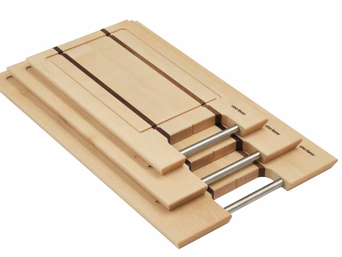 Handcrafted maple cutting board with walnut inlay by uno form