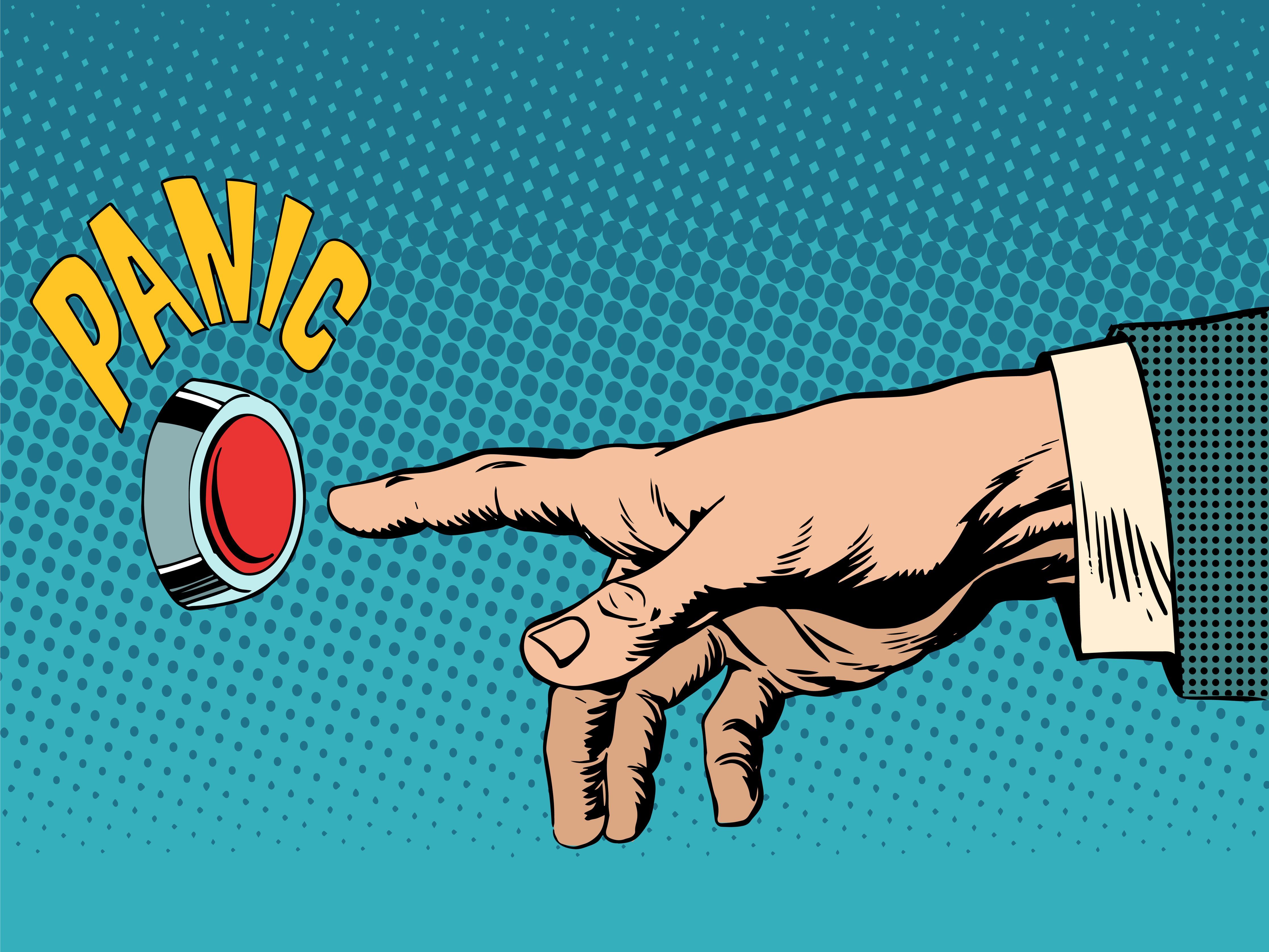 A hand reaching for a red panic button