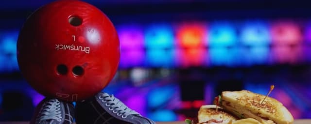 bowling ball and shoes with food, venue activity/food — Forest Lanes, from its own website