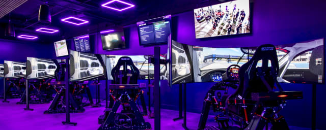 venue interior with racing simulator rigs — Turn Zero Sim Racing, from its own website