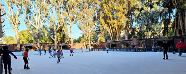ice skating rink with skaters — Winter Lodge, from its own website