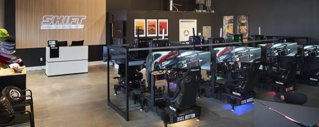 venue interior with racing simulator rigs — Shift Arcade, from its own website