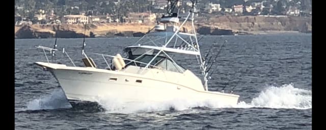 charter fishing boat underway — Dawn Charters, from its own website