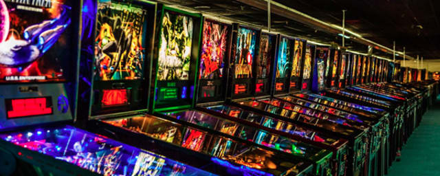 venue interior - rows of pinball machines — Museum Of Pinball, from its own website