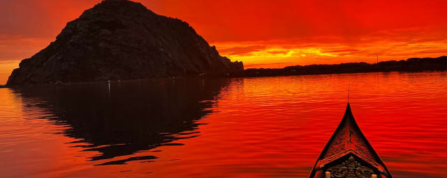 gondola bow on water at sunset — Central Coast Gondola, from its own website