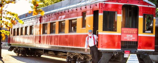 venue train car photograph with physical signage — Folsom, El Dorado, & Sacramento Hist RR Assoc - Folsom Railroad Museum, from its own website