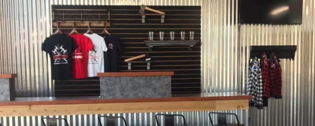 venue interior/bar area — Timberlords - Axe Throwing Range, from its own website
