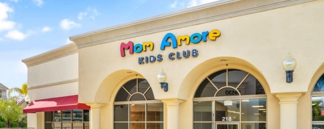 storefront exterior — Mom Amore Kids Club Oceanside, from its own website