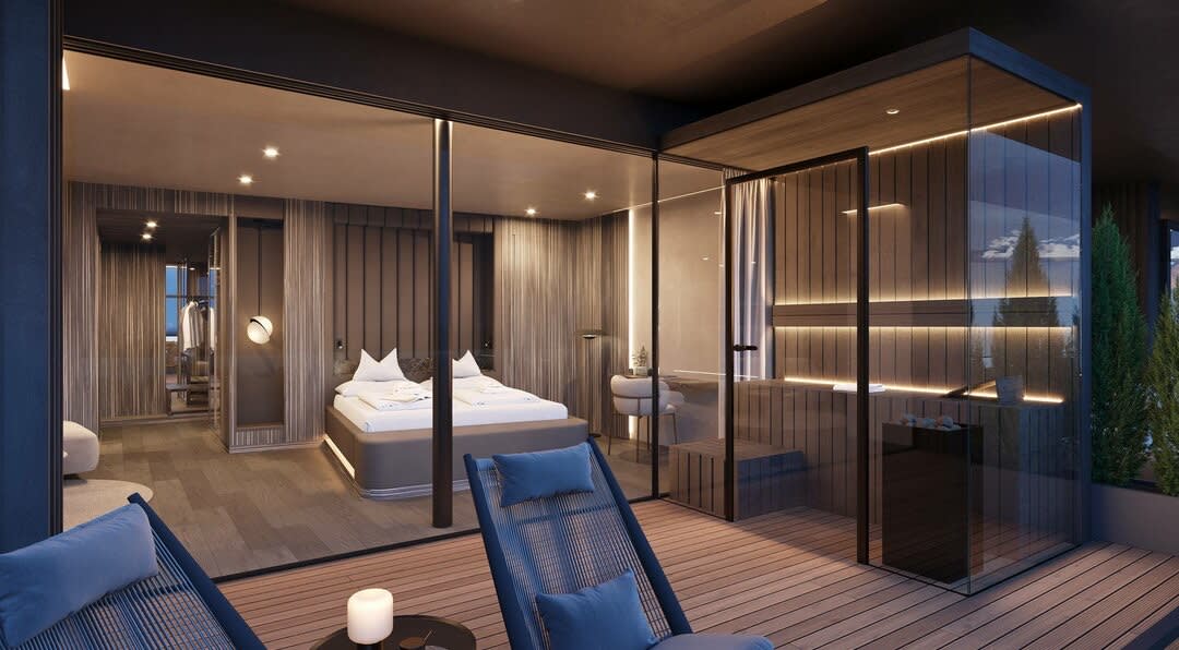 Terrace of a Terra suite at the Viktoria Alpine Hideaway with private glass-enclosed sauna and sun loungers