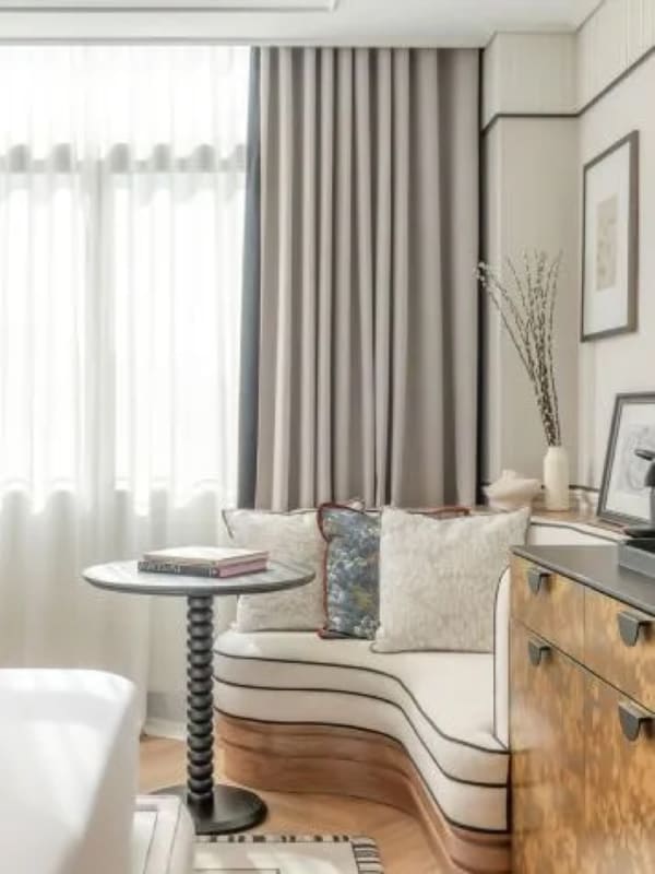 A room at BLESS Barcelona, with fluted wood furniture and natural light