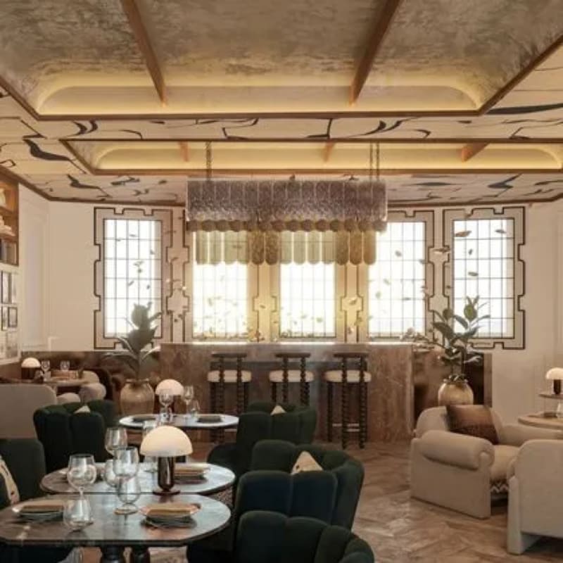 The SINEDIE dining room at BLESS Barcelona, with its painted ceiling, green banquettes and bar at the back
