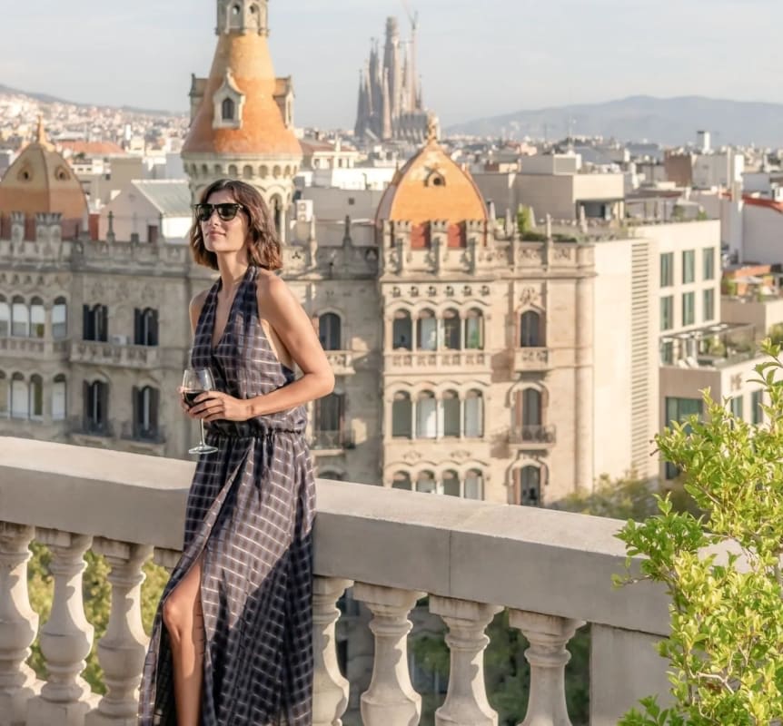 The view from the BLESS Barcelona rooftop over the modernista roofs of the Eixample and the Sagrada Família