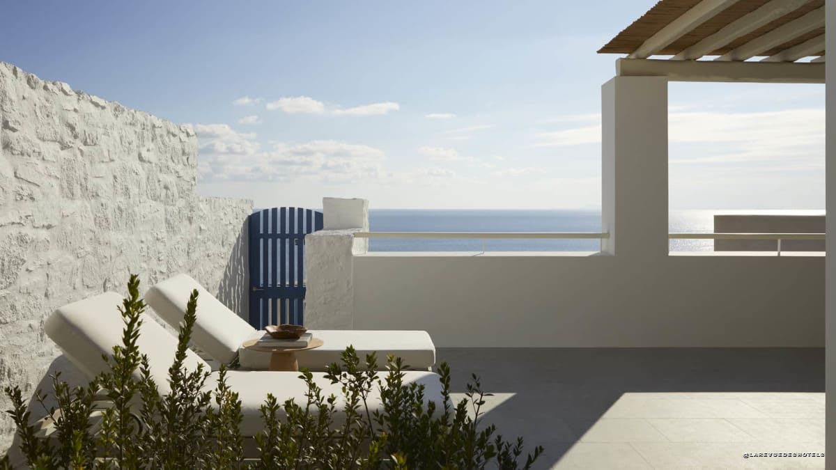 Cycladic terrace at Four Seasons Mykonos opening onto the Aegean Sea