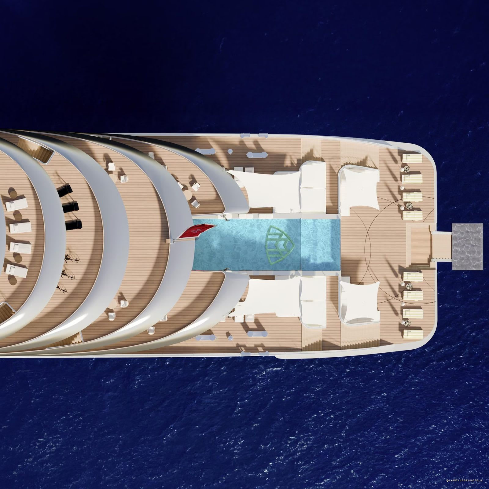 Aerial view of the deck and pool of the Beyond Horizons gigayacht · La Revue des Hôtels