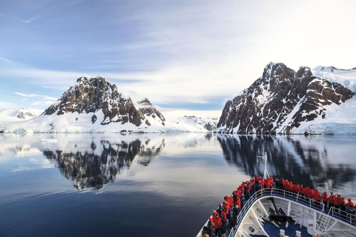 Silversea expedition ship in the Antarctic ice, departing from Puerto Williams