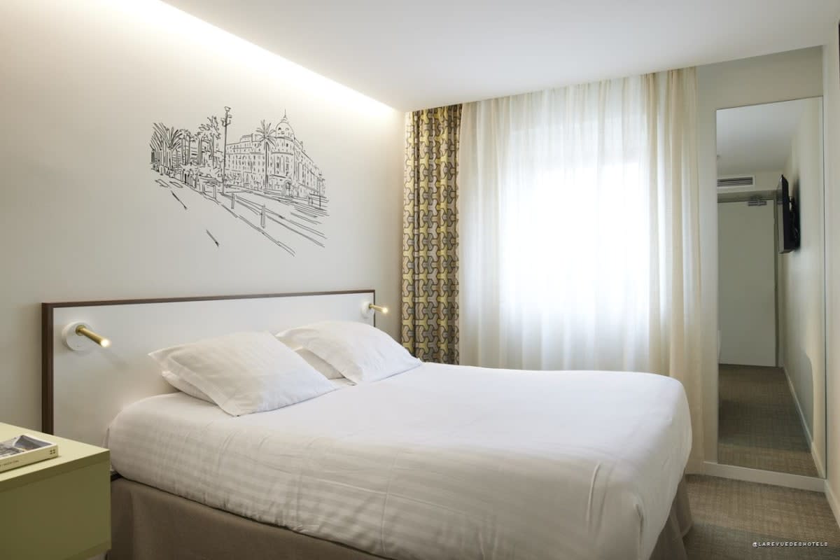 Hôtel du Pin room decorated with a hand-drawn mural
