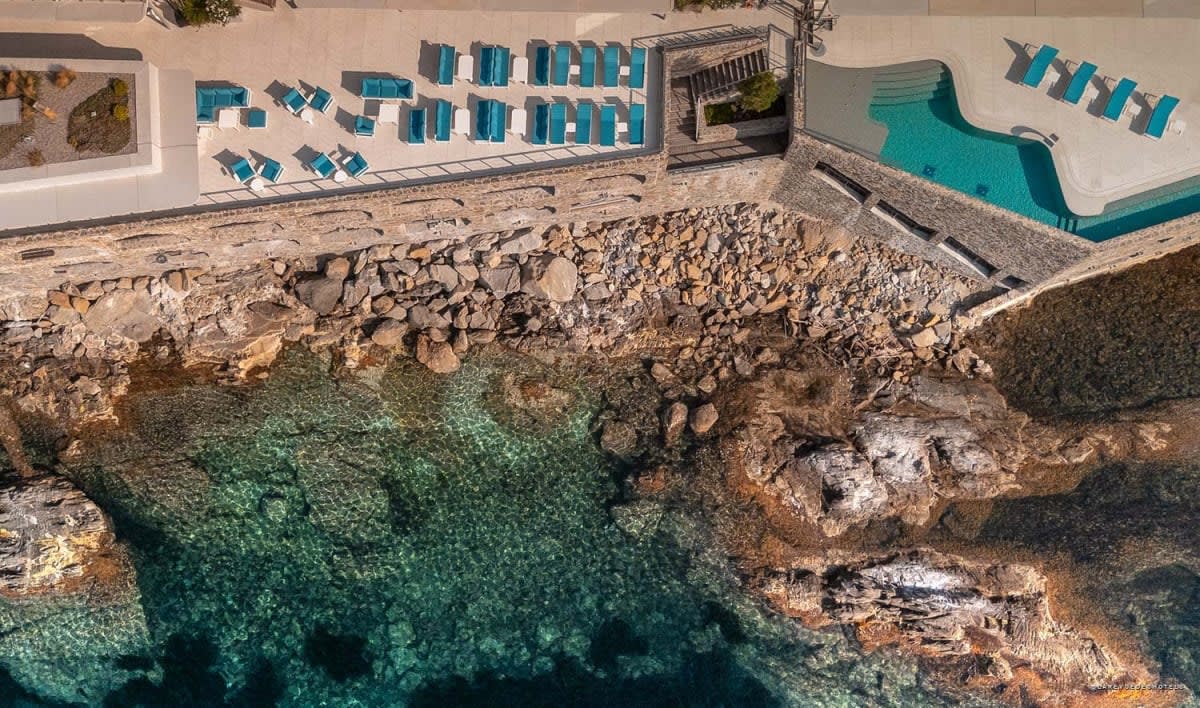 Aerial view of the terraces and swimming pool at Hôtel Les Roches