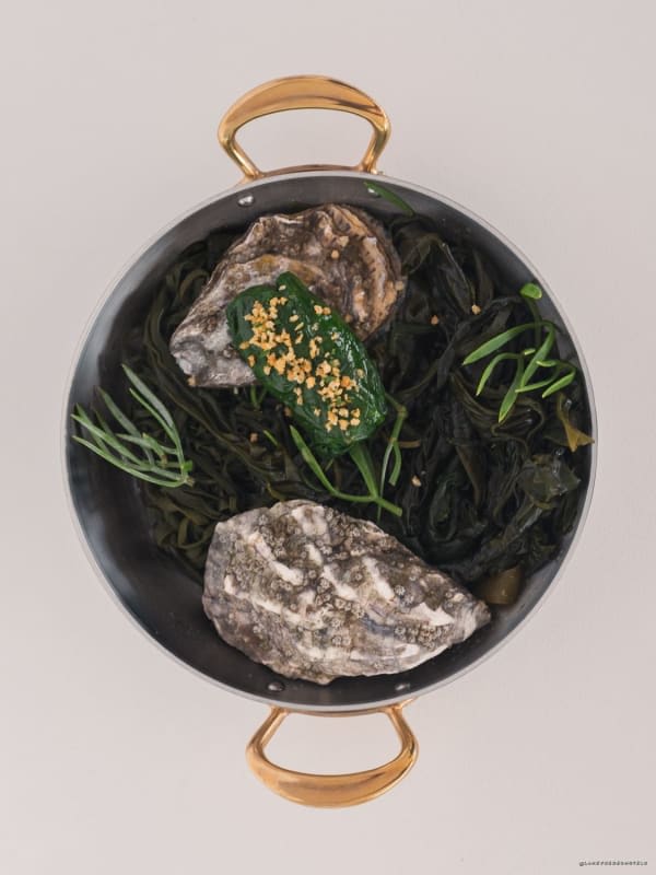 Shellfish and seaweed dish served at L'Oursin restaurant