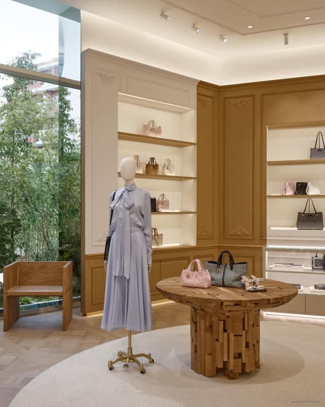 Leather goods space at the Dior Bamboo Pavilion, pale wood and herringbone floor
