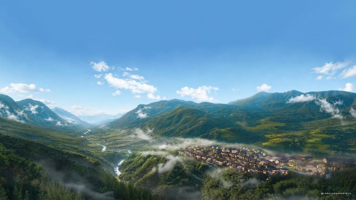 Vue aérienne des 79 villas de The Residences at InterContinental Sapa Resort dans la vallée de Muong Hoa, sous les nuages