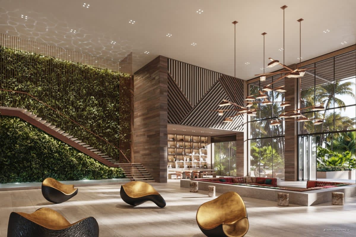 Lobby du Grand Hyatt Grand Cayman avec mur végétal et escalier sculptural