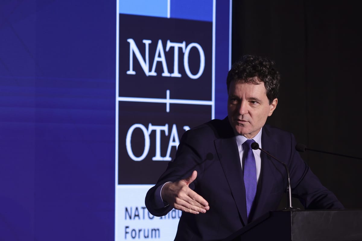 Romanian official speaking at NATO forum, energy infrastructure