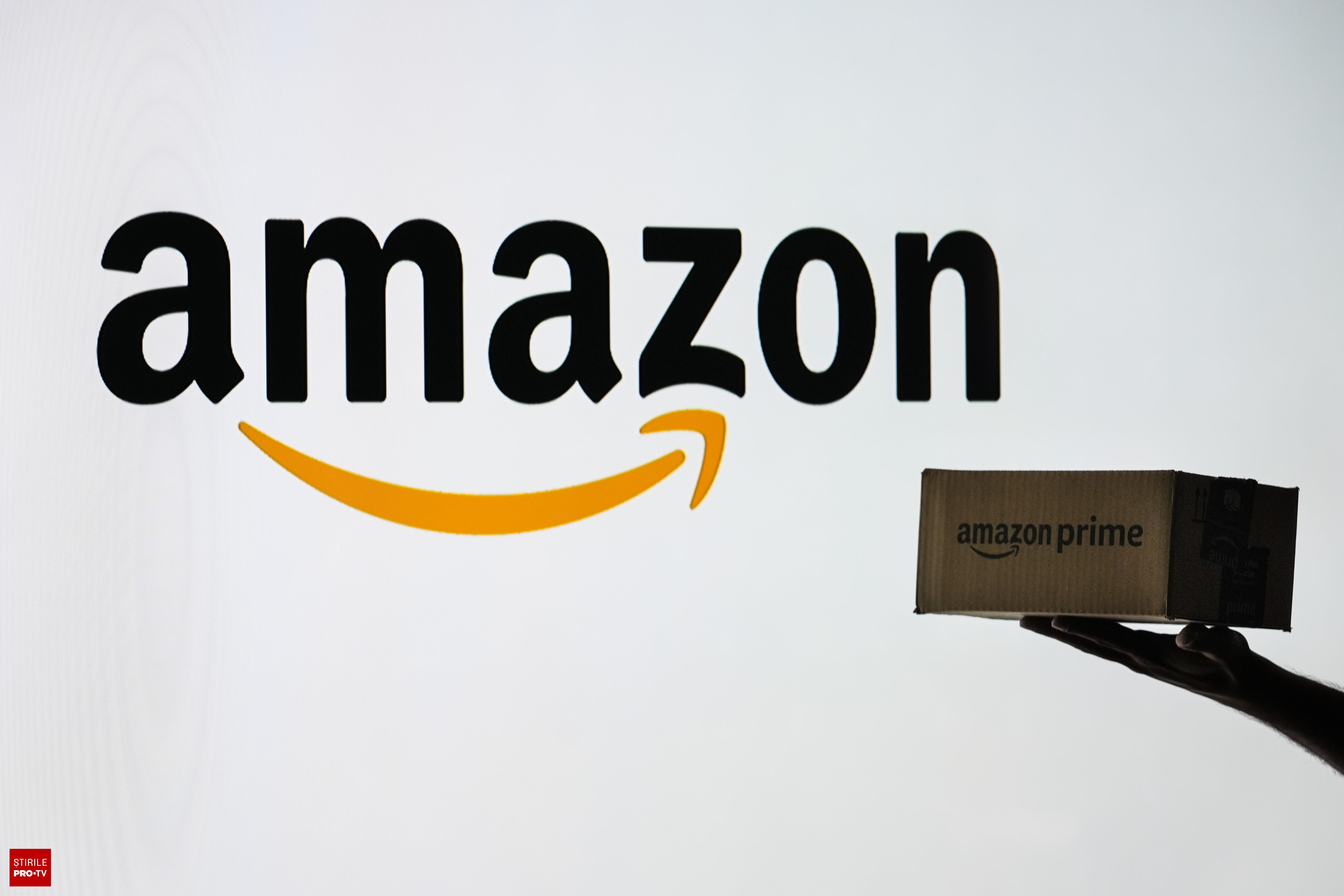 Imagine cu tribunalul din Seattle și logo-ul Amazon Imagine cu tribunalul din Seattle și logo-ul Amazon