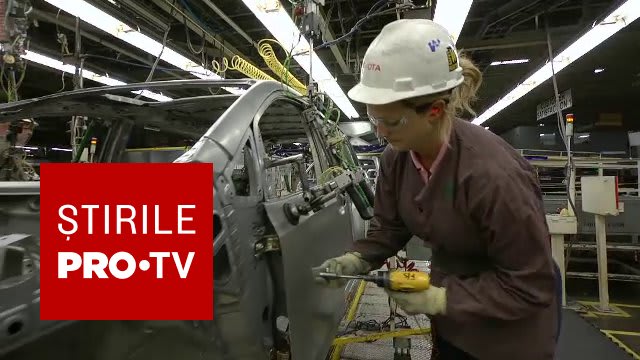 Fabrică auto Volkswagen în Europa, muncitori în producție