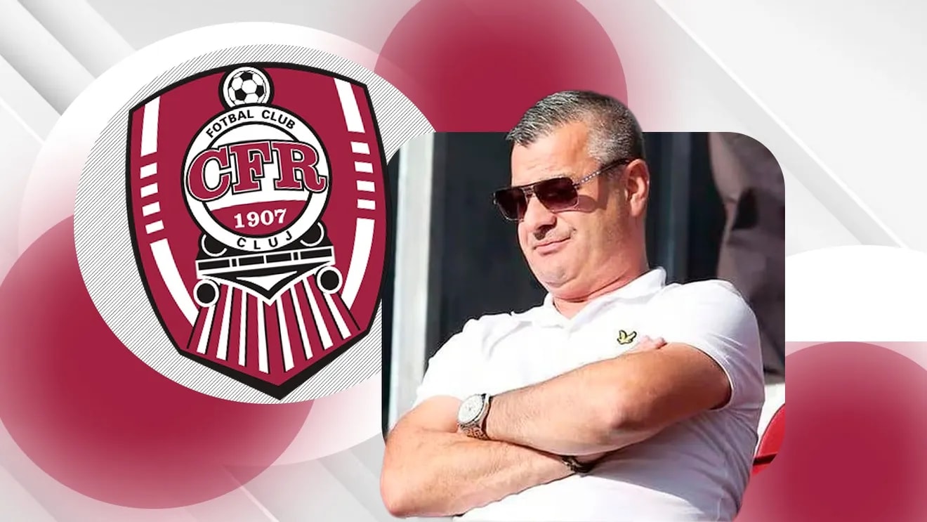 Neluțu Varga și echipa CFR Cluj în timpul unei conferințe de presă