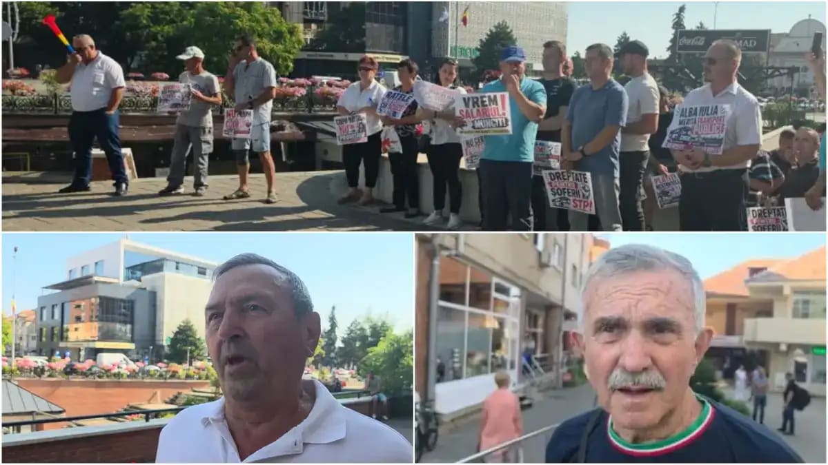 Albaiulieni protestând în fața primăriei, oameni cu pancarte