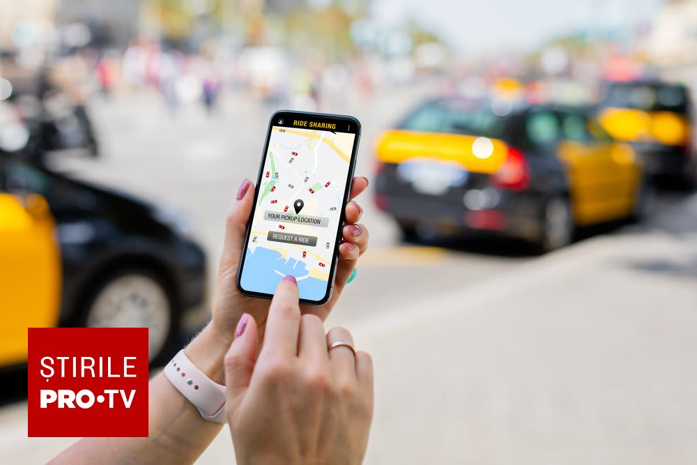 Romanian ride-sharing driver using emergency button on smartphone Romanian ride-sharing driver using emergency button on smartphone