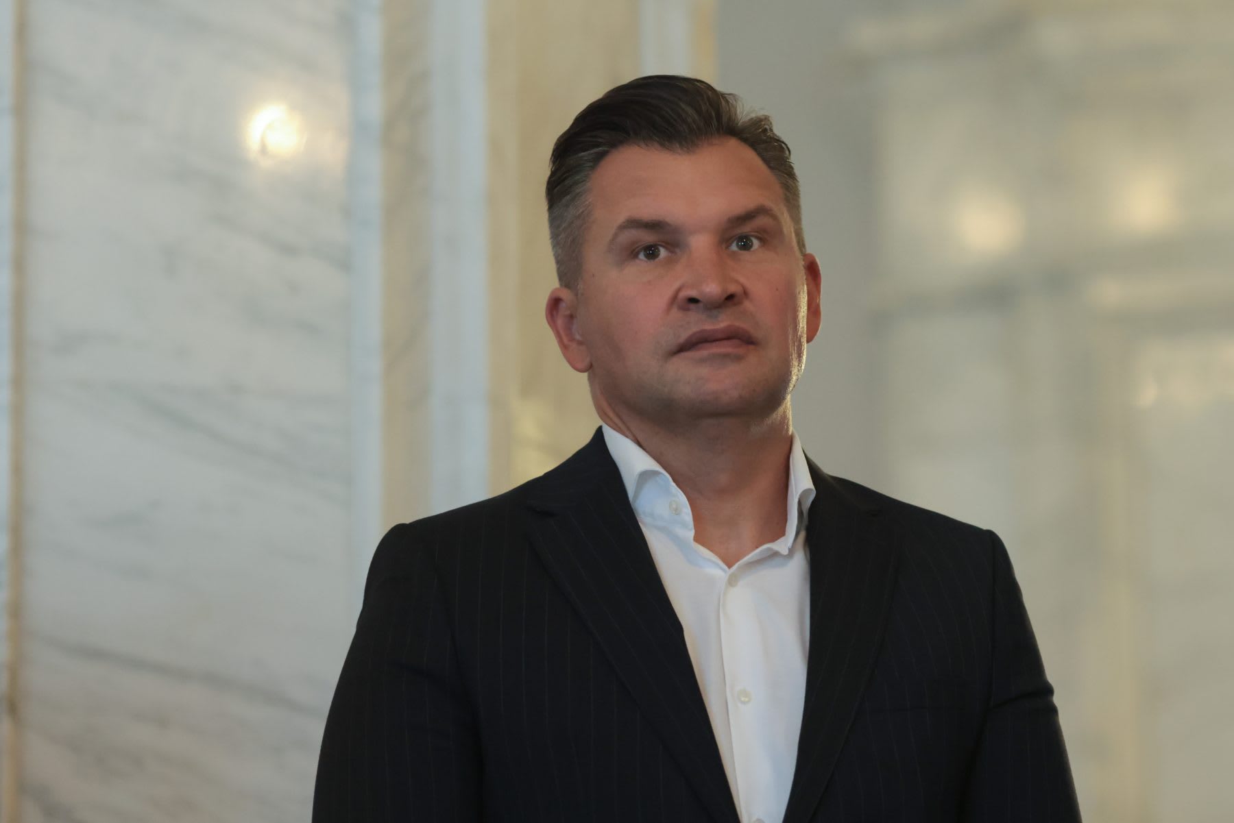 Ionuț Stroe la o conferință de presă