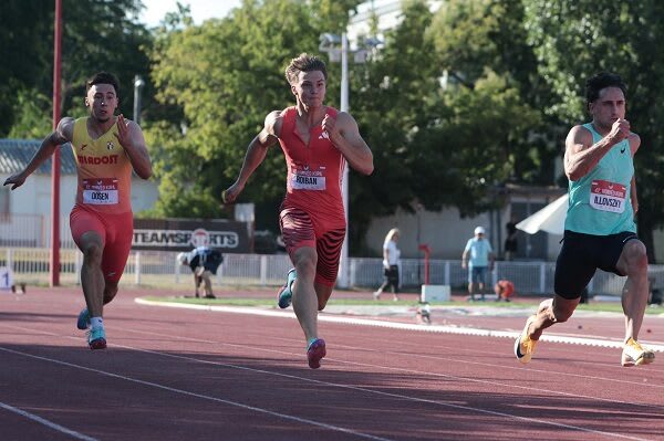 Sprinter român câștigând cursa de 100 metri la Budapesta