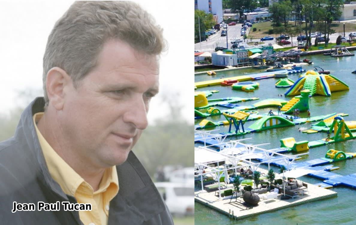 Tucan în stațiunea Costinești, pe fundal lac și oameni
